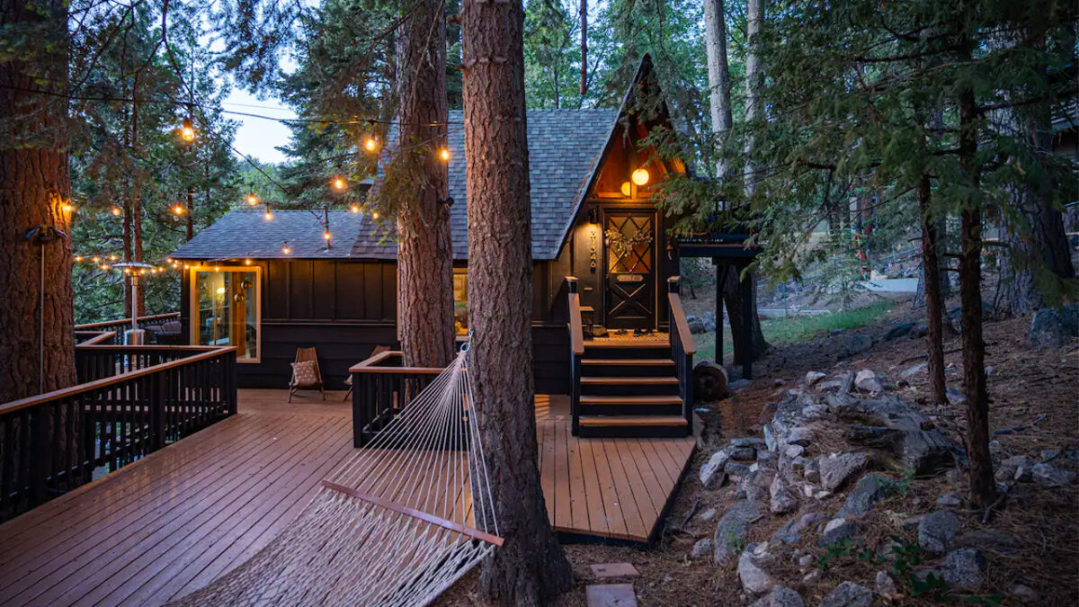 Lightfoot Cabin Has Theater Room Hidden Behind Bookcase Door