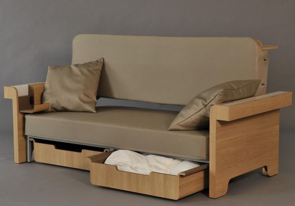 Transforming sofa converts into dining table and bed for two