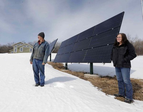 Couple with solar panels