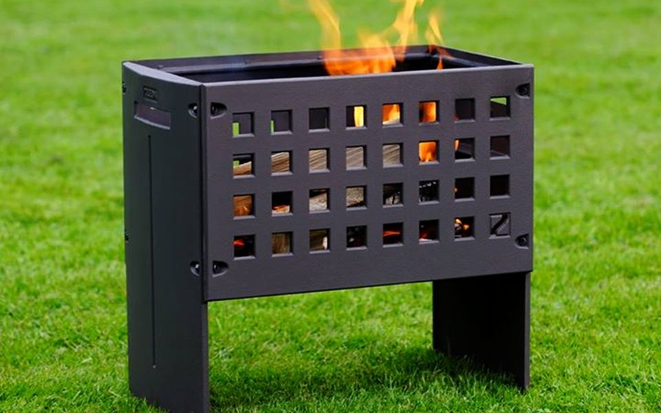 Helex OutFire Firebox offers outdoor fireplace and barbecue allinone