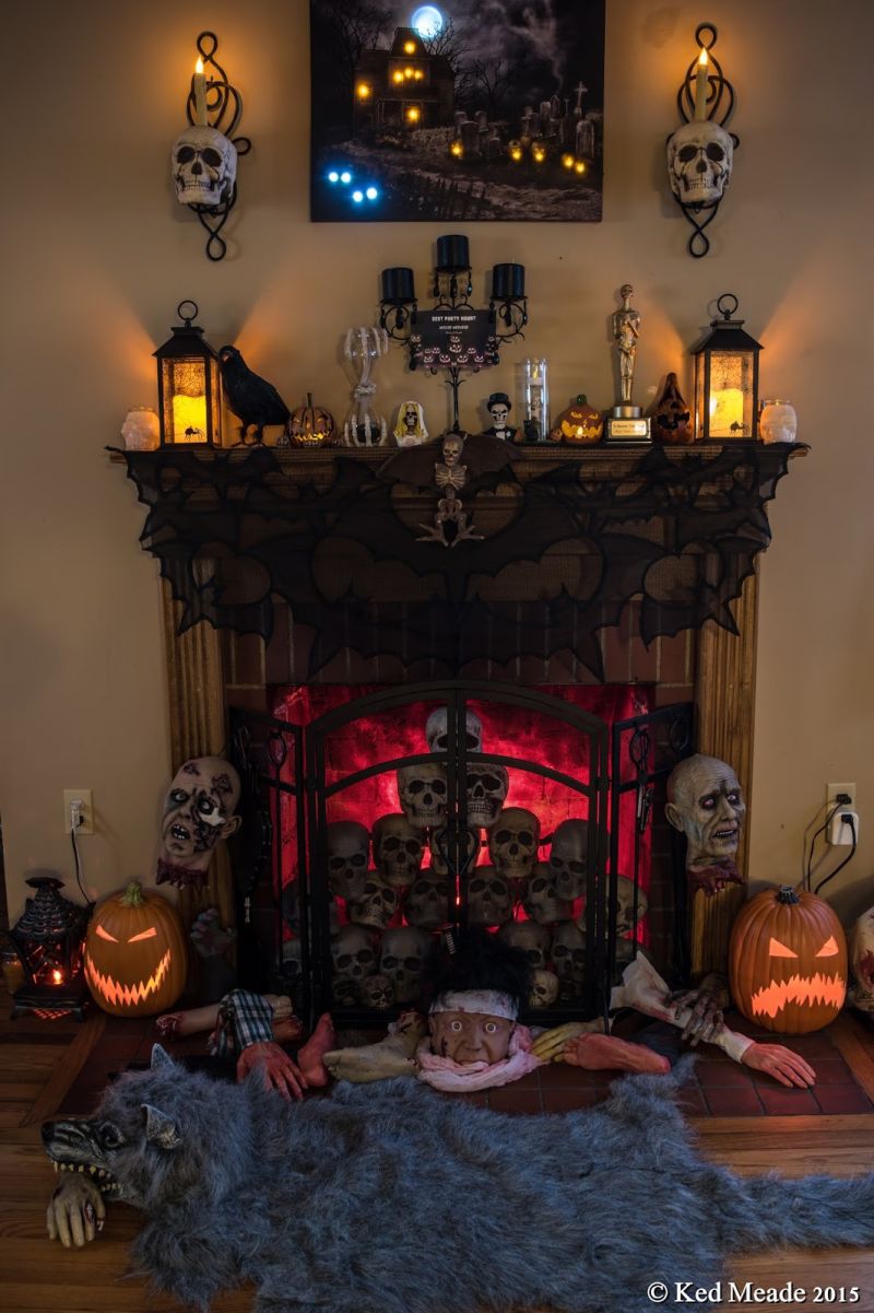 Halloween lights for behind a stack of skulls inside fireplace 