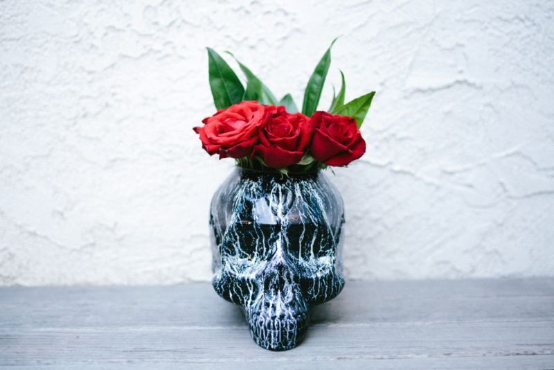 skull planter with roses for Halloween living room decor 