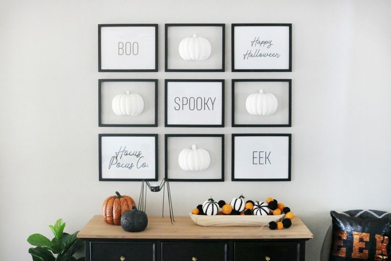 Spooky Wall décor with black and white picture frames 