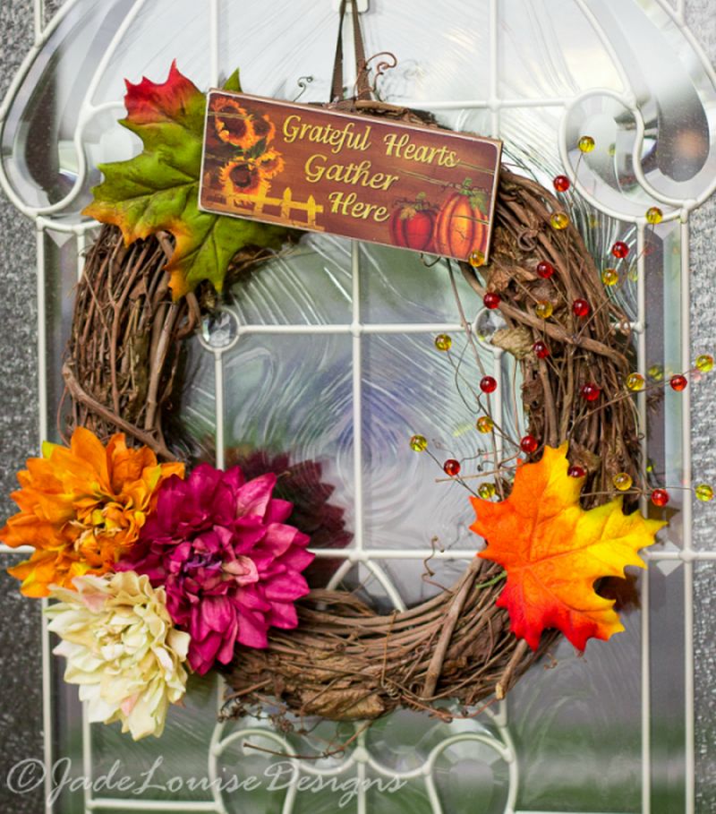 simple harvest wreath with autumn leaves and silk flowers 