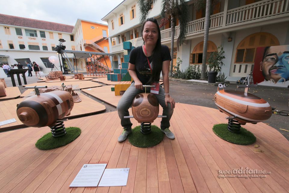 Designer Chan Wai Lim with her design in SingaPlural 2015, Singapore