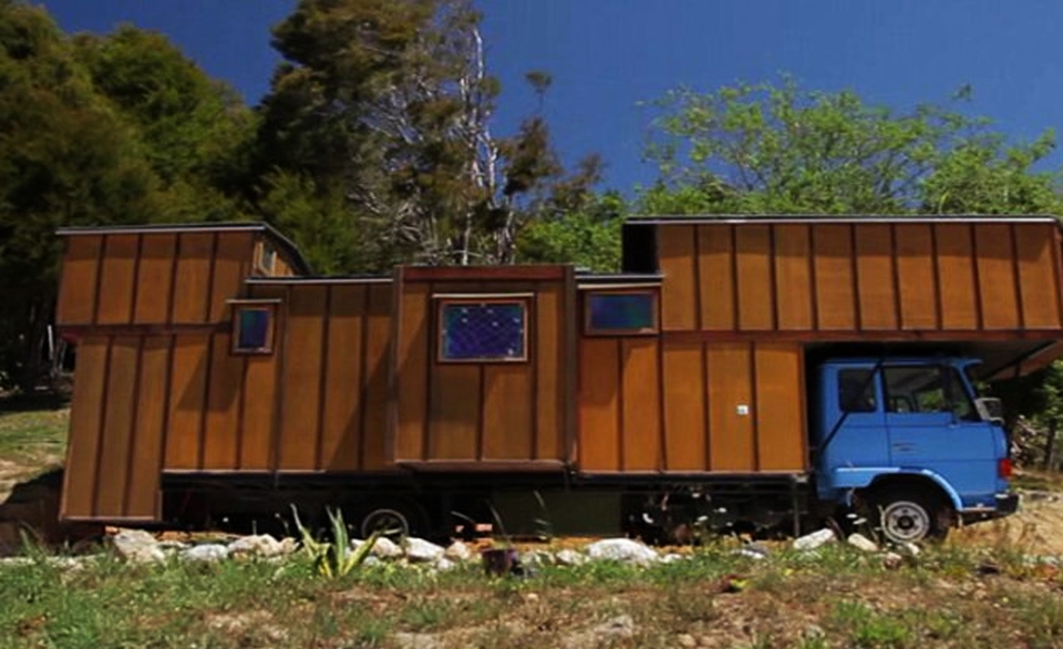 New Zealand couple revamps old flatbed truck into solar-powered home