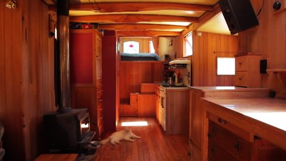 New Zealand couple revamps old flatbed truck into solar-powered home 