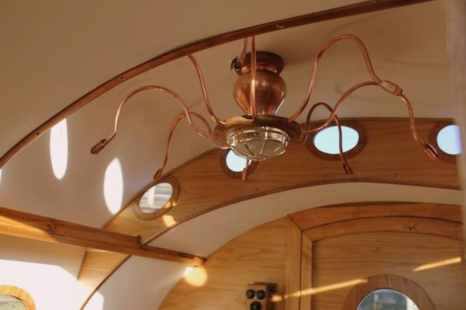 Chandelier made from old coffee pot and copper pipes