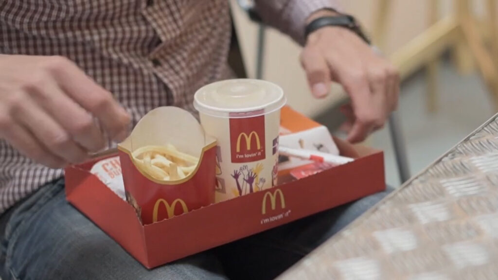 McDonald's takeout bag with tearaway strip turns into serving tray