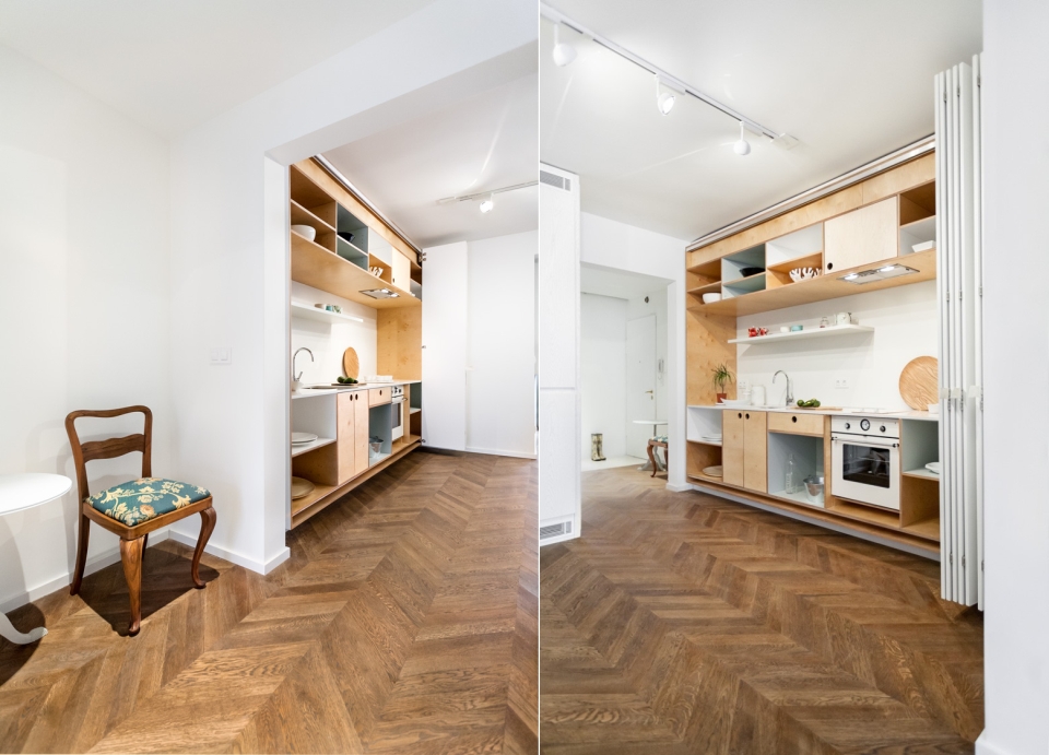 Bright home hides kitchen behind a folding wall