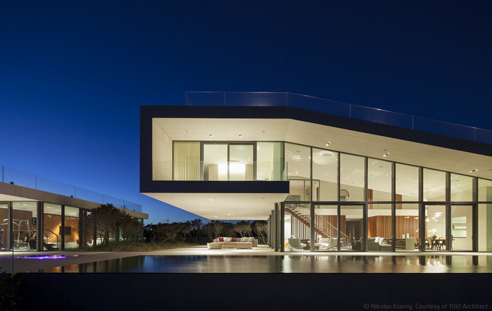 Night view of Long Island House by 1100 Architects