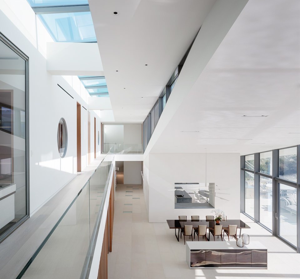 Combination of natural lights from skylights and artificial lights create bright environment