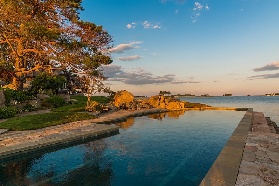 The 75-foot lap pool overlooking at one of the three private beaches