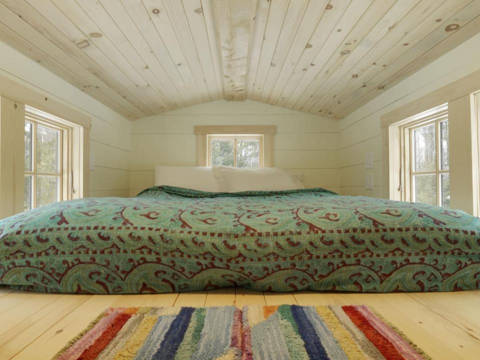 The sleeping roof space, with windows to let natural light and air come in abundance