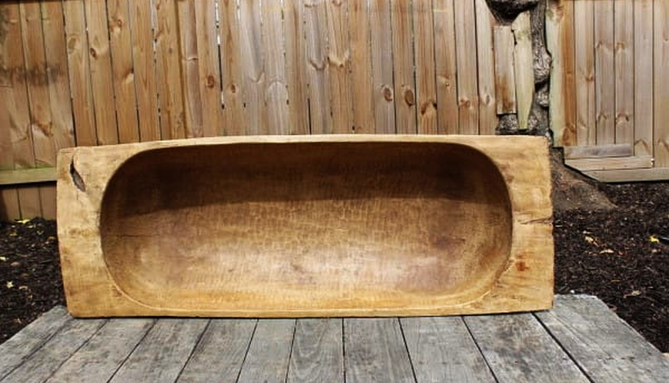 Antique dough bowl into chic coffee table