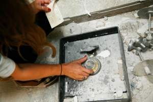 Couple discovers a mystery safe under kitchen floor