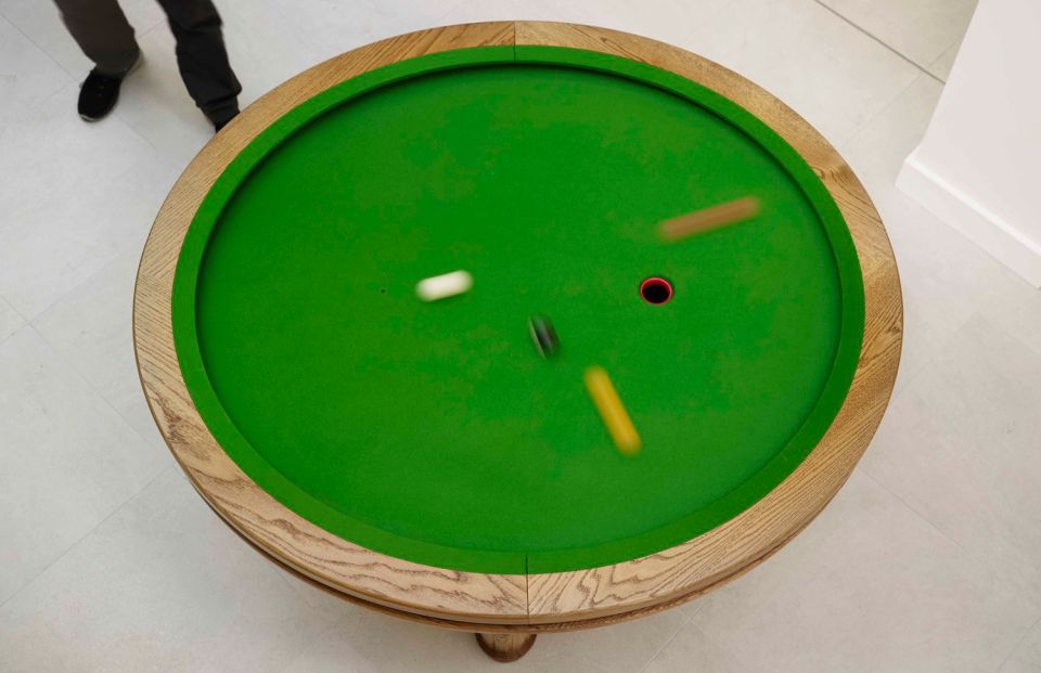 Elliptical pool table or a miniature golf course?