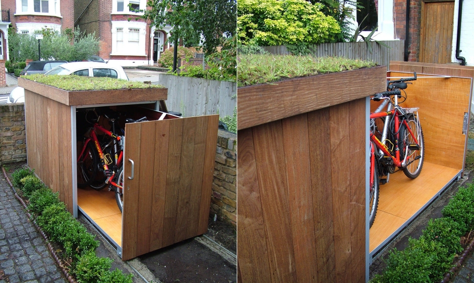 Contemporary outdoor bike locker doubles as clever green planter