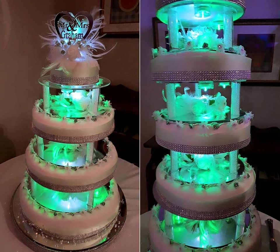 Seven-tier wedding cake by Joahua Nunnley