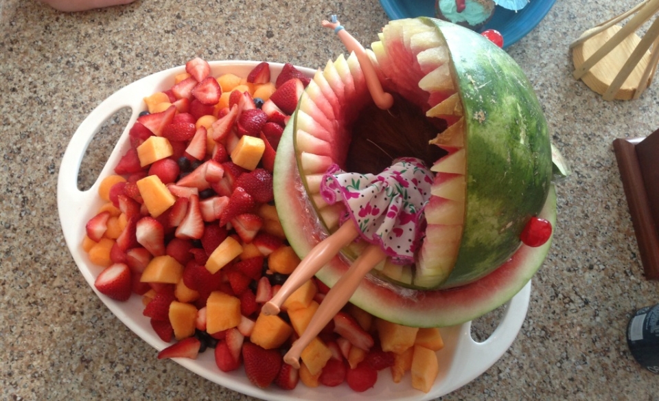 Shark gobbling human body Watermelon carving