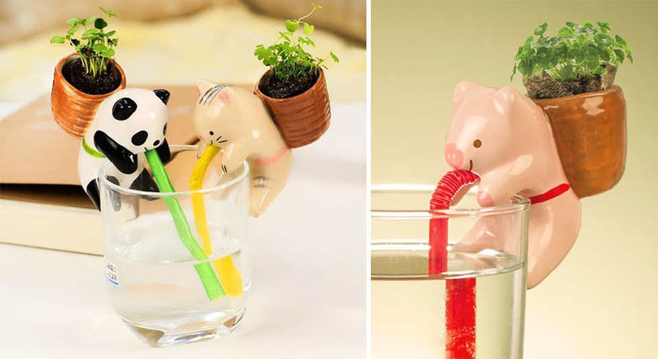 Self-watering animal planters