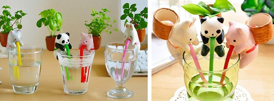 Self-watering animal planters