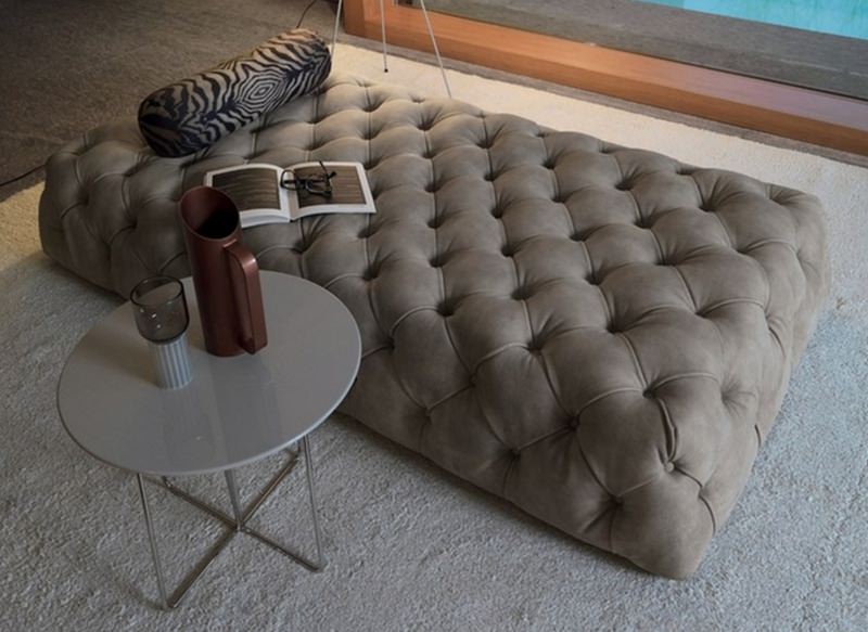 Rollking floor-level sofa by Désirée