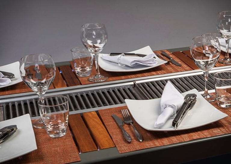 Angara Maximus dining table with builtin grill at the center