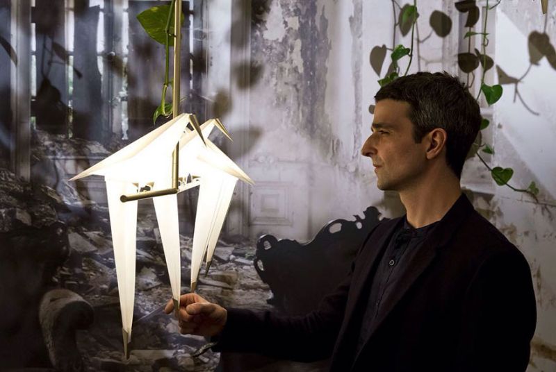 Origami bird-shaped swinging light by Umut Yamac