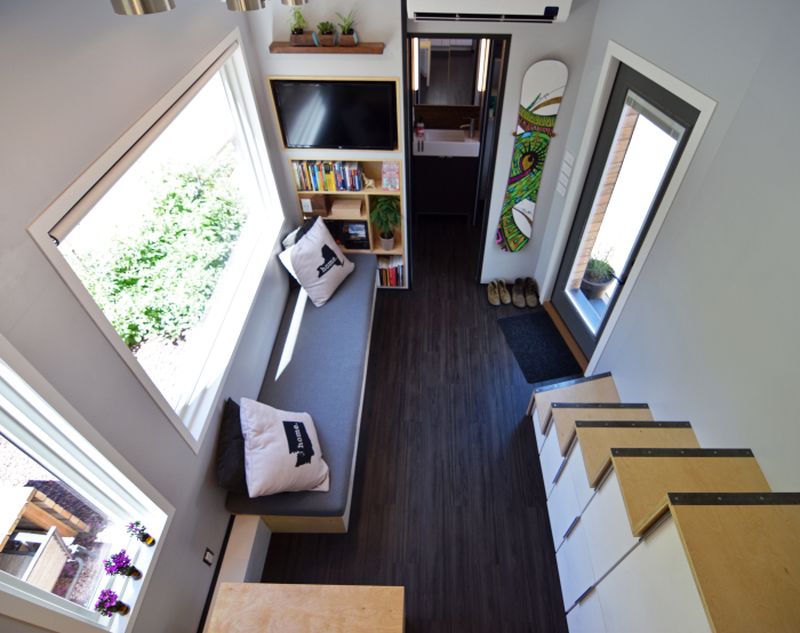 Dark wooden floor with light accented walls