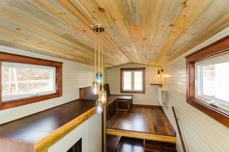 Loft bedroom with wooden texture ceiling 