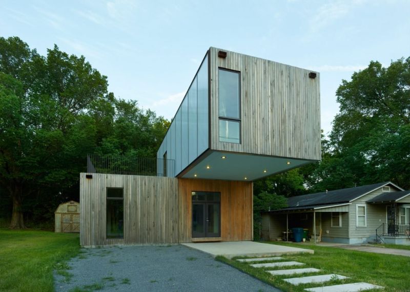 Interesting structure offers two small patios and a roof deck 