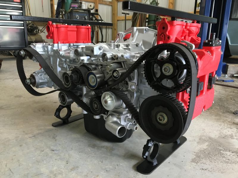 Duo of father & son builds WRX Boxer engine coffee table in wrinkle red touch_17