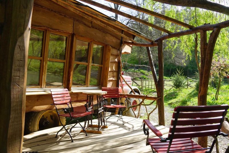 Wooden porch has enough space to enjoy the landscape outside 