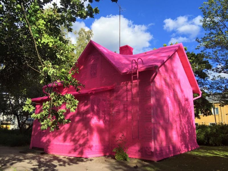 Yarn-bombed entire house in pink fabric 