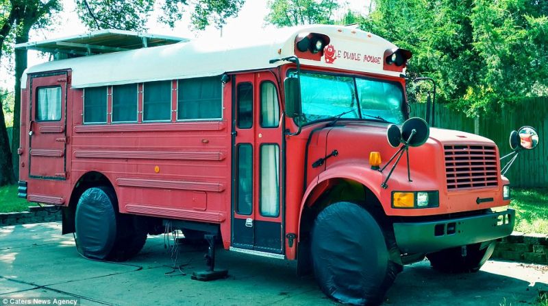 Pipe fitter turned red school bus into a living space on wheels