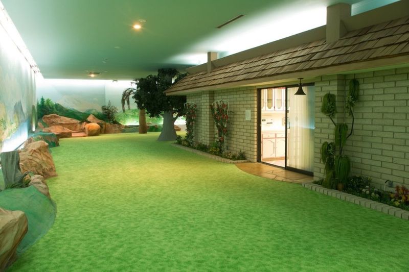 Shingled roof with fake trees and fountains 