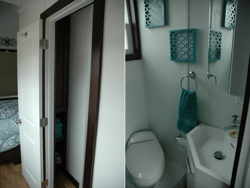 Bathroom with a porcelain RV toilet and Corian shower