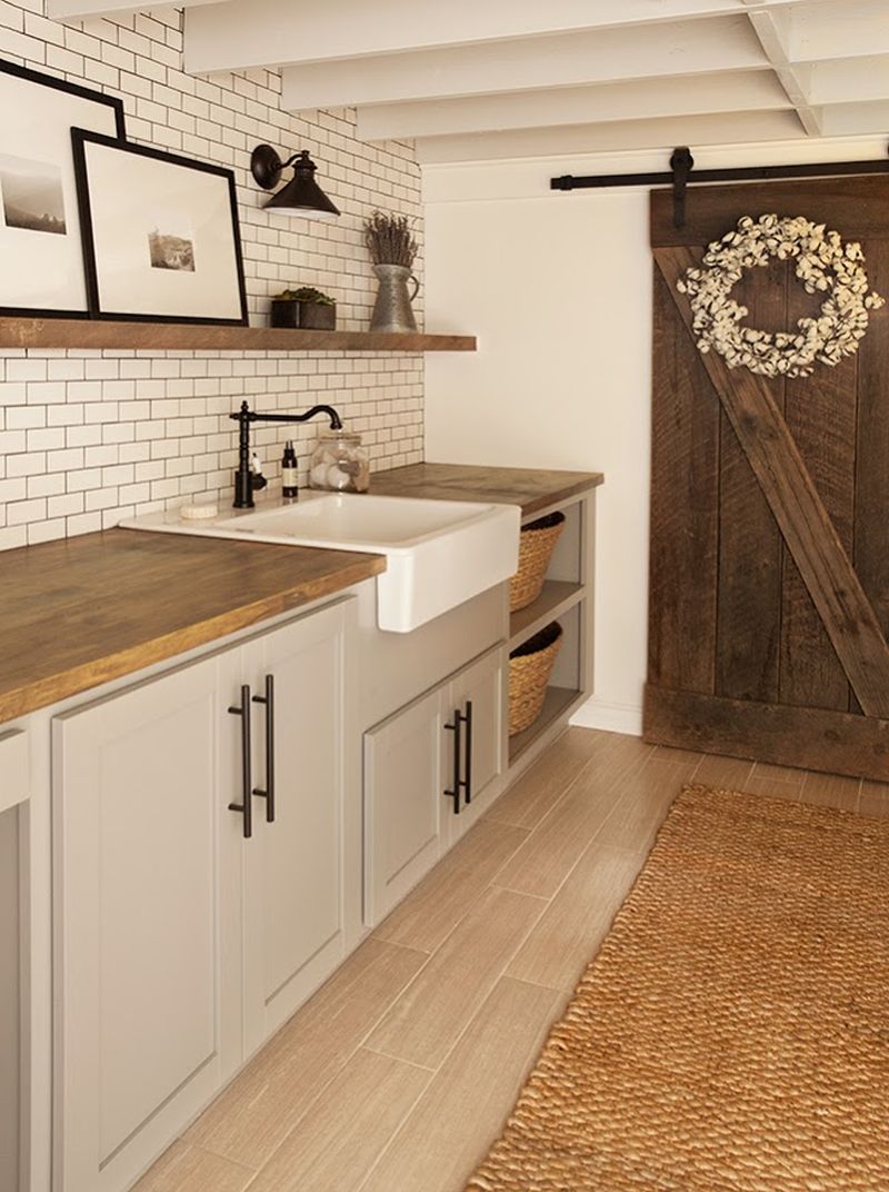 Smart use of reclaimed wood in shelving and doors to give it a rustic look  