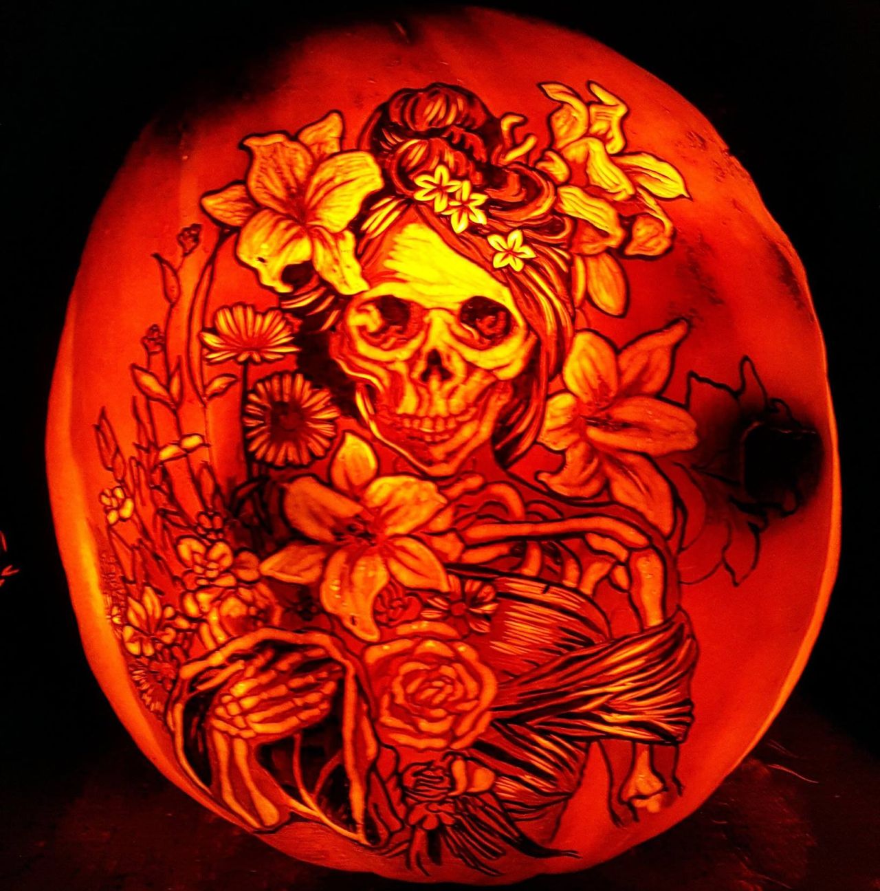 Celebrating All Hollows' Eve With Santa Muerte Pumpkin