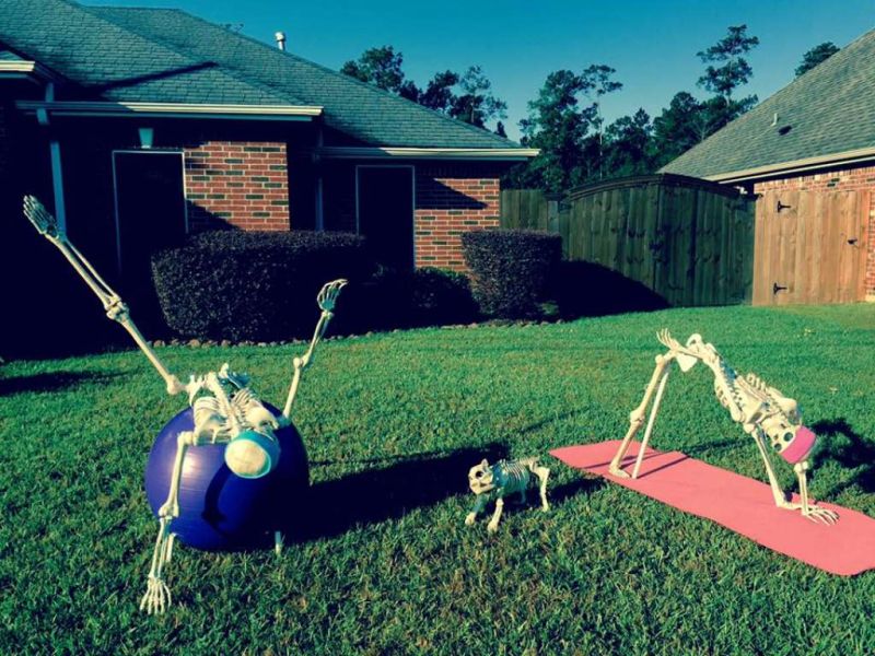 Our front lawn Halloween decor this year  We modded last year's skeleton  breakdancers into warrior II - inspired by starting yoga recently! : r/yoga