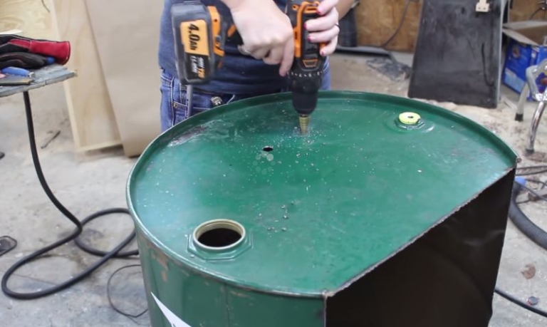 DIYer upcycles Old Drum into Functional Scrap Wood-Burning Pit