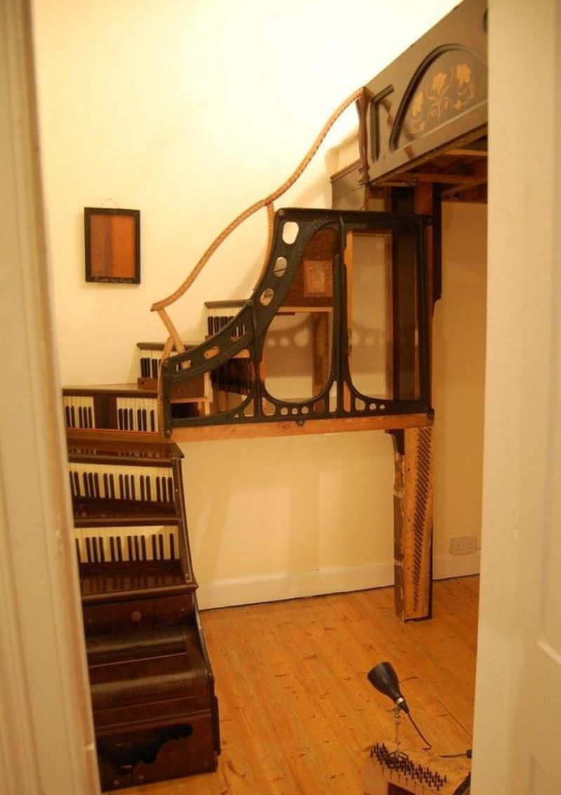 Boxroom staircase and floating double bed made from two upright pianos, Edinburgh.