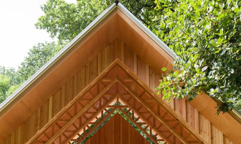 Gabled roof with wooden paneling creates pleasing space 