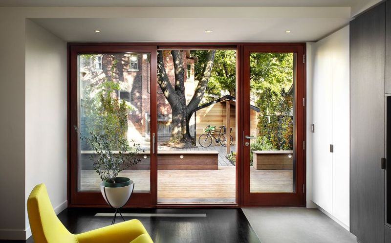 Facade made with zinc panels and glazed glass doors 