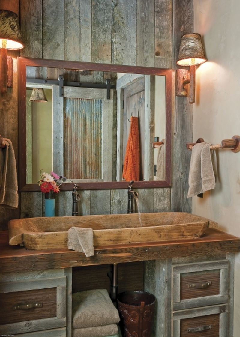 Recycled wooden bowl as sink in complete bathroom 