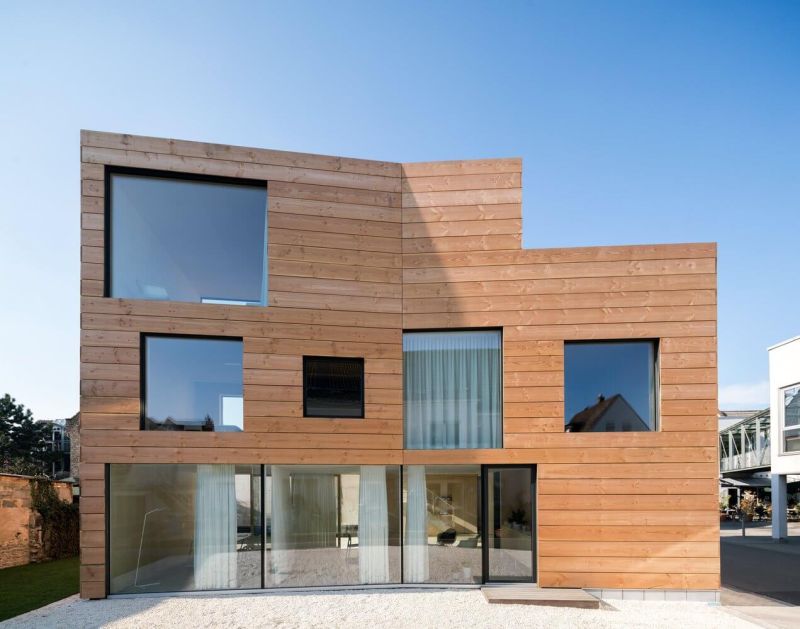 Wooden exteriors with large glass windows 