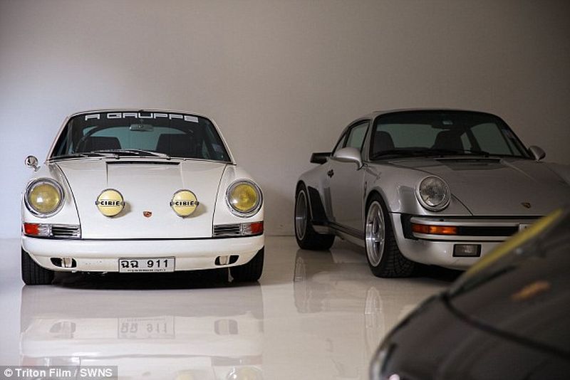 Thai man builds glass elevator in lounge to display his Porsche cars