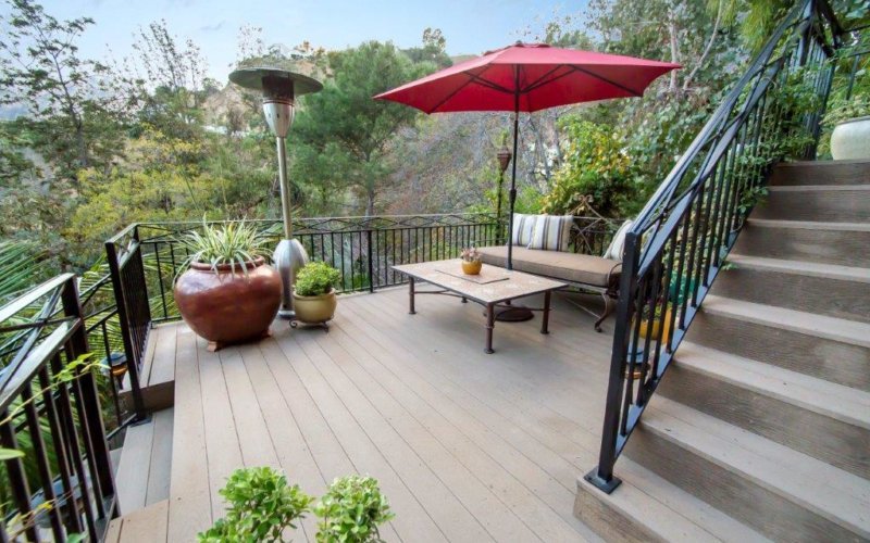 various patios alongside big staircase 