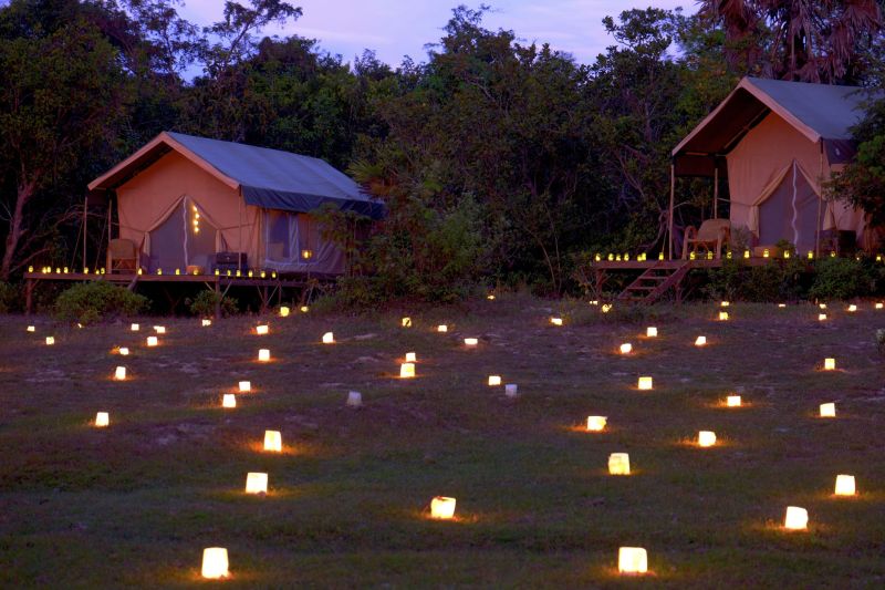 Light candles to brighten up tent accommodations 